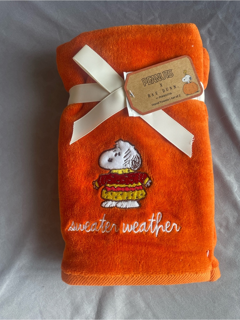 Peanuts Orange Sweater Weather Hand Towels by Rae Dunn